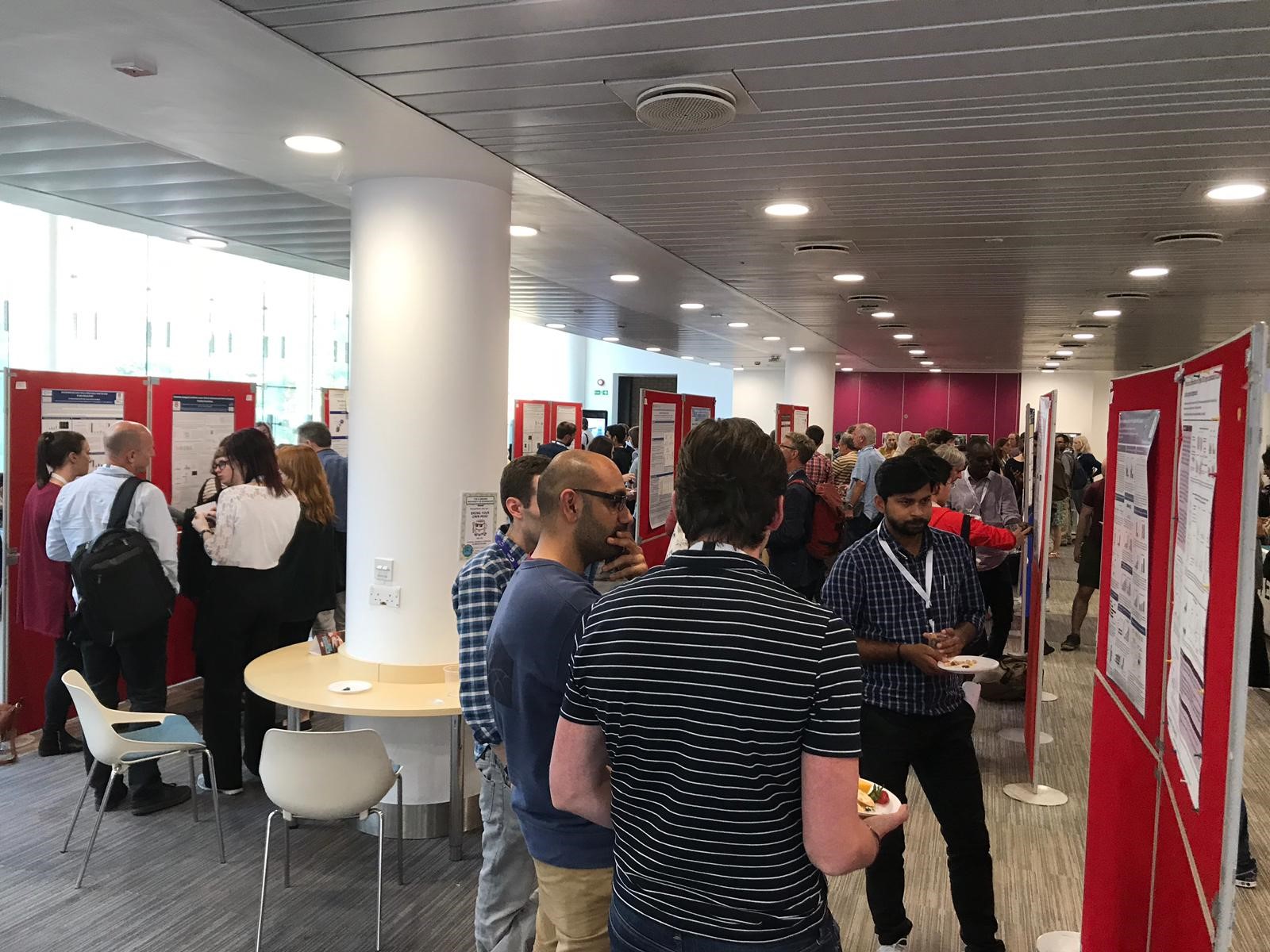 Guests looking at poster presentations