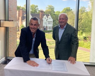 Executive Director of Birmingham Health Partners, Professor Neil Hanley, and ABHI Chief Executive, Peter Ellingworth, sign the MoU agreement